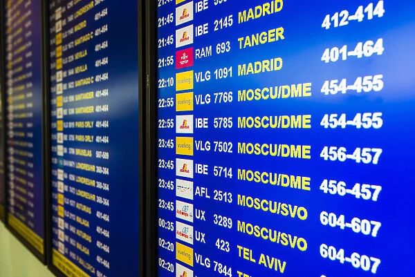 Departure board monitor at Barcelona El Prat international airport, Barcelona, Catalonia