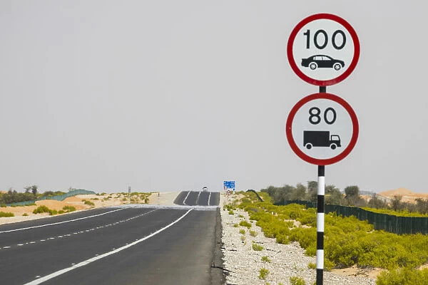 Desert road south of Abu Dhabi, United Arab Emirates
