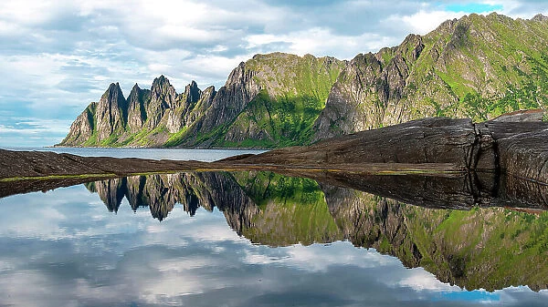 Devil's teeth Mountain mirrored, Ersfjorden, Senja, Northern Norway