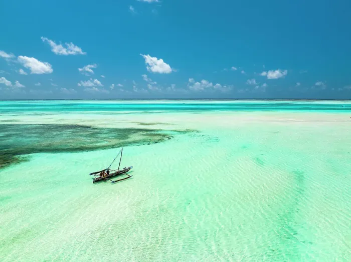 Framed Print : Dhow boat in the turquoise lagoon during low tide, Paje, Jambiani, Zanzibar, Tanzania Framed Print : Dhow boat in the turquoise lagoon during low tide, Paje, Jambiani, Zanzibar, Tanzania