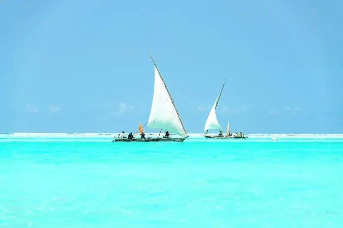 Framed Print : Dhow boats sailing in the crystal turquoise water of the Indian Ocean, Paje, Jambiani, Zanzibar, Tanzania Framed Print : Dhow boats sailing in the crystal turquoise water of the Indian Ocean, Paje, Jambiani, Zanzibar, Tanzania
