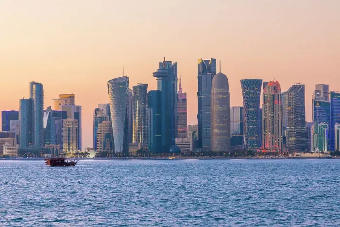 Framed Print : A Dhow in the Harbour with the West Bay Skyline at Dusk, Doha, Qatar