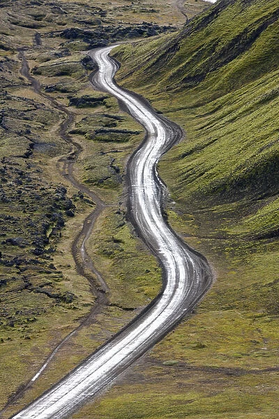 Dirt road & moss covered mountains, Landmannalaugar, Southern Highlands, Iceland