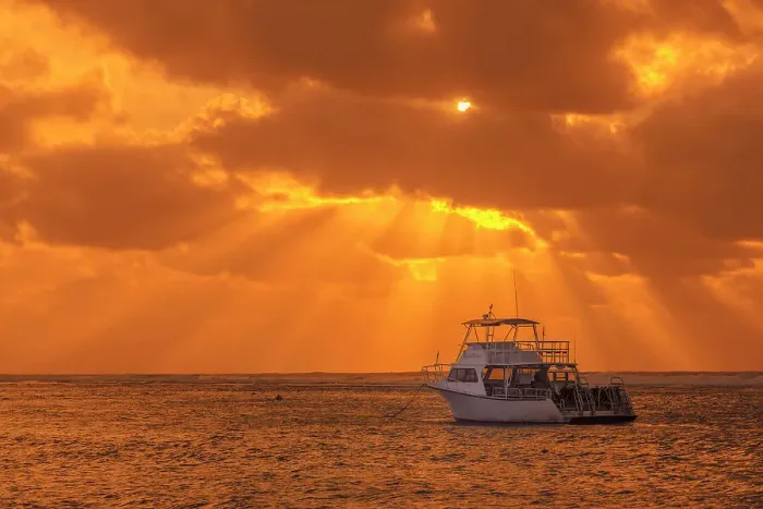 Framed Print : Dive boat at sunrise on the Caribbean Sea on Cayman Brac, Cayman Islands, British West Indies Framed Print : Dive boat at sunrise on the Caribbean Sea on Cayman Brac, Cayman Islands, British West Indies