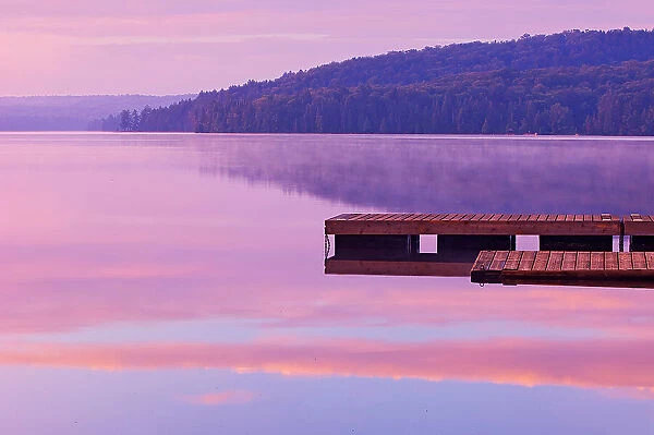 Dock and fog on Lake of Two Rivers Algonquin Provincial Park, Ontario, Canada