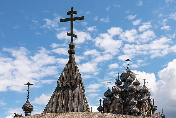Domes and crosses of the Church of Intercession (Pokrovskaya Church), built in full accordance with the technologies of the 18th century, from wood without the use of nails, near Saint Petersburg, Russia