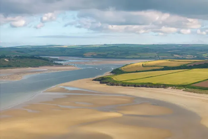 Framed Print : The Doom Bar is revealed at low tide in the Camel Estuary near Padstow, Cornwall, England. Summer (June) 2023