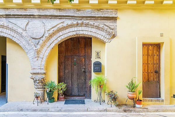 Door in the courtyard of Iglesia de Nuestra Senora de La Paz, Seville, Andalusia, Spain