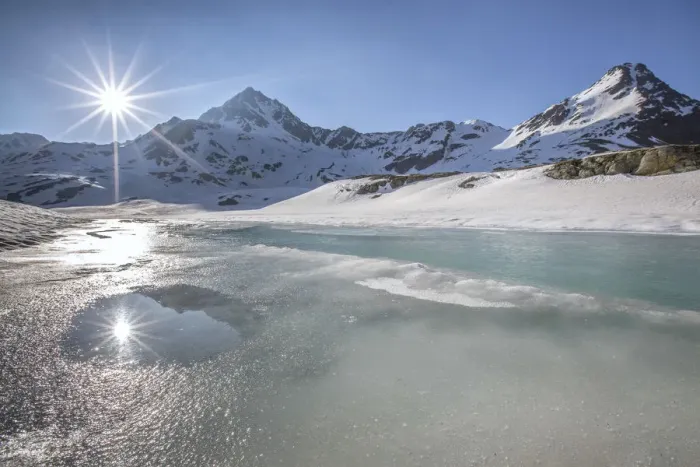 Framed Print : A double sun reflecting in a pool during the vernal thaw at the Lake Bianco - Gavia pass Framed Print : A double sun reflecting in a pool during the vernal thaw at the Lake Bianco - Gavia pass