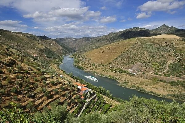 The Douro river and a hotel-ship in the Valeira Dam. Sao Joao da Pesqueira, Portugal