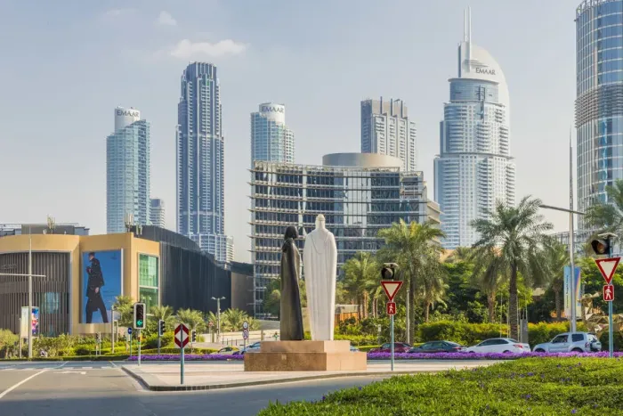 Framed Print : Downtown Dubai and the Arabic Couple Statue (Together by Lufti Romein), Dubai Framed Print : Downtown Dubai and the Arabic Couple Statue (Together by Lufti Romein), Dubai
