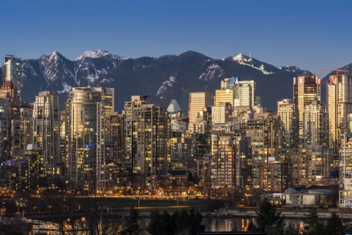 Framed Print : Downtown skyline with snowy mountains behind at dusk, Vancouver, British Columbia, Canada Framed Print : Downtown skyline with snowy mountains behind at dusk, Vancouver, British Columbia, Canada