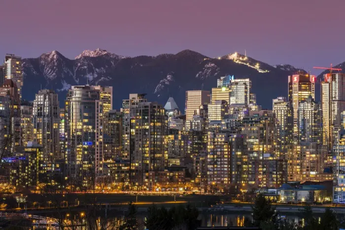 Framed Print : Downtown skyline with snowy mountains behind at dusk, Vancouver, British Columbia, Canada Framed Print : Downtown skyline with snowy mountains behind at dusk, Vancouver, British Columbia, Canada