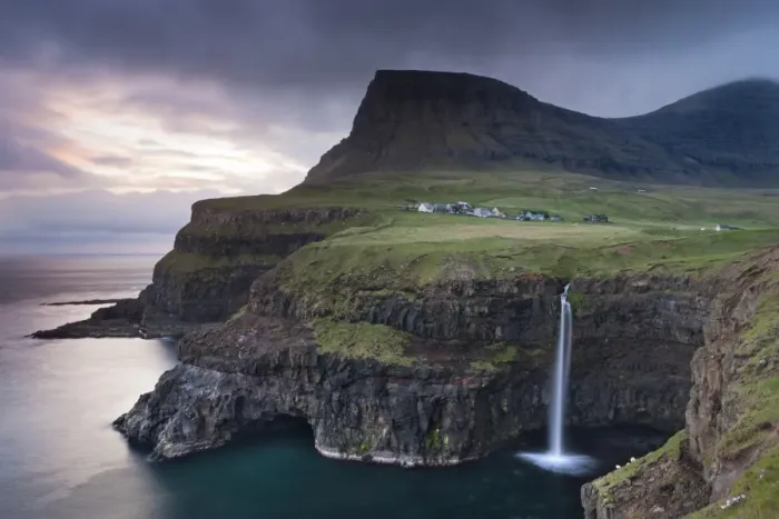 Framed Print : Dramatic coastal scenery at Gasadalur on the island of Vagar, Faroe Islands. Spring Framed Print : Dramatic coastal scenery at Gasadalur on the island of Vagar, Faroe Islands. Spring