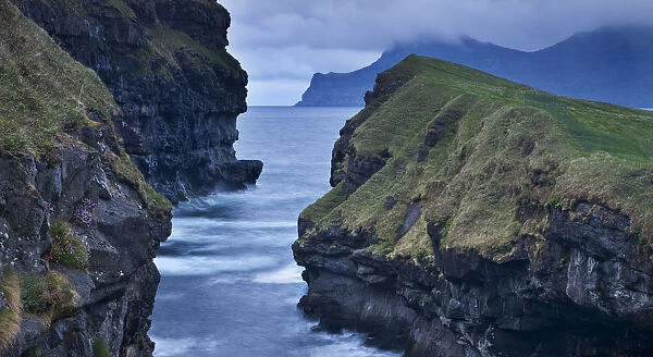 Dramatic coastline at Gjogv on the island of Eysturoy, Faroe Islands. Spring
