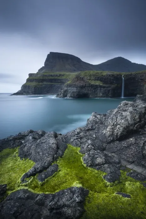 Framed Print : Dramatic coastline and waterfall at Gasadalur on the Island of Vagar, Faroe Islands Framed Print : Dramatic coastline and waterfall at Gasadalur on the Island of Vagar, Faroe Islands