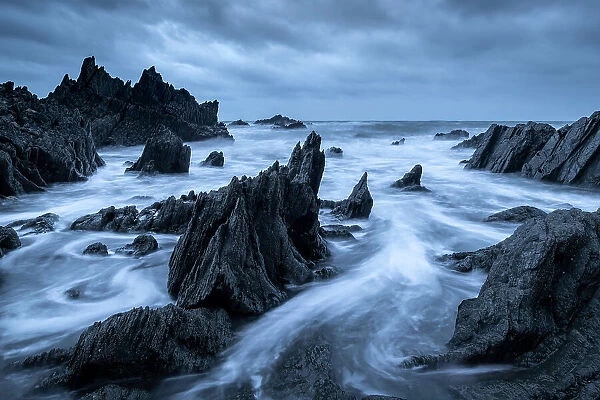 Dramatic rocky seashore on the North Devon coast, Devon, England. Winter (January) 2019