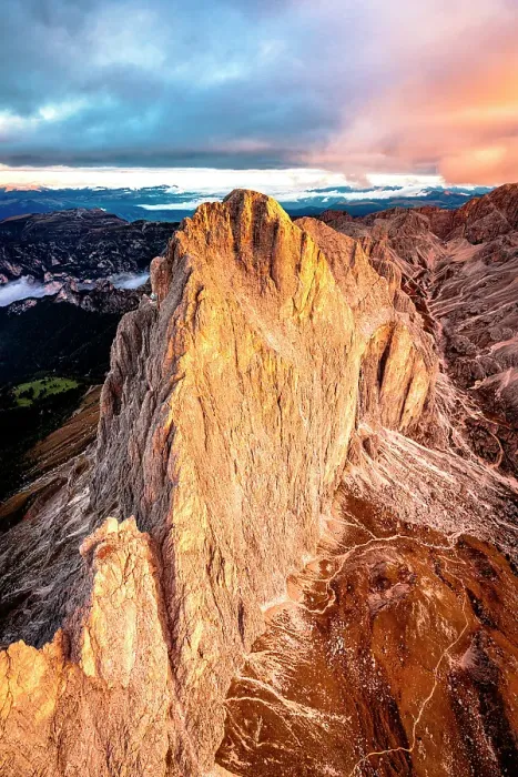 Framed Print : Dramatic sky at dawn over Catinaccio (Rosengarten) and Cima Catinaccio mountains in autumn, aerial view, Dolomites, Italy Framed Print : Dramatic sky at dawn over Catinaccio (Rosengarten) and Cima Catinaccio mountains in autumn, aerial view, Dolomites, Italy