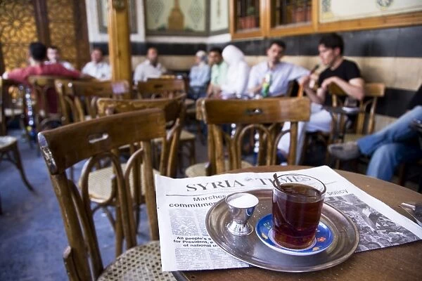 Drinking tea in the famous Al Nawfara cafe in Old Damascus