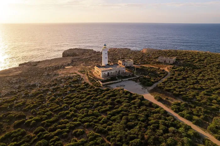 Framed Print : Drone view of the lighthouse Capo Murro di Porco standing on top of a cliff surrounded by Ionian sea at sunrise, Plemmirio marine park, Syracuse, Sicily, Italy Framed Print : Drone view of the lighthouse Capo Murro di Porco standing on top of a cliff surrounded by Ionian sea at sunrise, Plemmirio marine park, Syracuse, Sicily, Italy