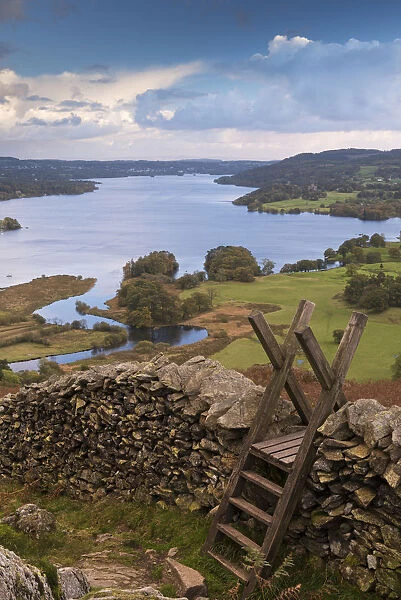 Drystone wall and stile above Windermere in the Lake District, Cumbria, England. Autumn