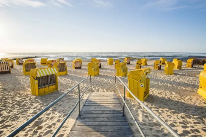Framed Print : Duhnen, Cuxhaven, Lower Saxony, Germany. Yellow Strandkorbs along the beach Framed Print : Duhnen, Cuxhaven, Lower Saxony, Germany. Yellow Strandkorbs along the beach