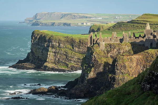 Dunluce Castle on the cliff tops of the Causeway Coast, County Antrim, Northern Ireland. Autumn (November) 2022