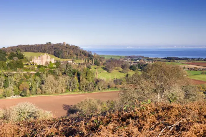 Framed Print : Dunster Castle and Conygar Tower, Exmoor National Park, Somerset, England Framed Print : Dunster Castle and Conygar Tower, Exmoor National Park, Somerset, England