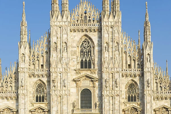 Duomos cathedral lit by the afteroon light in Milan, Italy