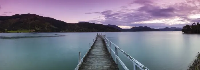 Framed Print : Dusk falls over picturesque wharf in idyllic Kenepuru Sound, Marlborough Sounds, South Island