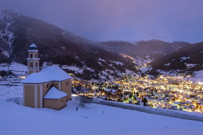 Framed Print : Dusk at Madonna di Ogas Church and Bormio town during winter, Bormio Framed Print : Dusk at Madonna di Ogas Church and Bormio town during winter, Bormio