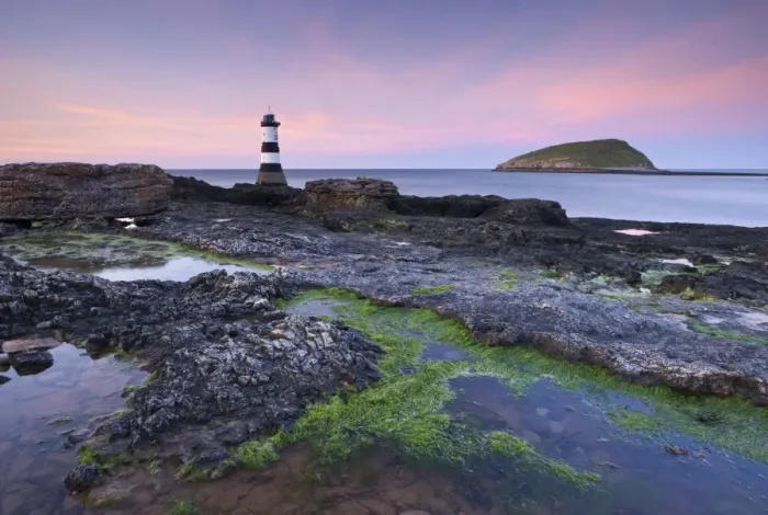 Framed Print : Dusk over Penmon Point Lighthouse and Puffin Island, Isle of Anglesey, Wales, UK. Spring Framed Print : Dusk over Penmon Point Lighthouse and Puffin Island, Isle of Anglesey, Wales, UK. Spring