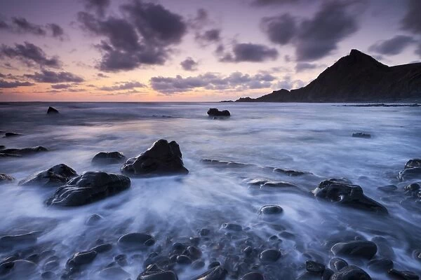Dusk on the rocky shores of Spekes Mill Mouth in North Devon, England. Summer