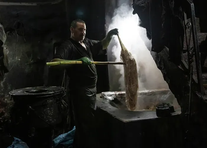 Framed Print : Dyer dying silk in the ancient dyer's souk (Souk des teinturiers), Marrakech, Morocco, Africa Framed Print : Dyer dying silk in the ancient dyer's souk (Souk des teinturiers), Marrakech, Morocco, Africa