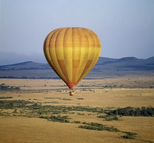 An early morning hot air balloon flight over Masai Mara