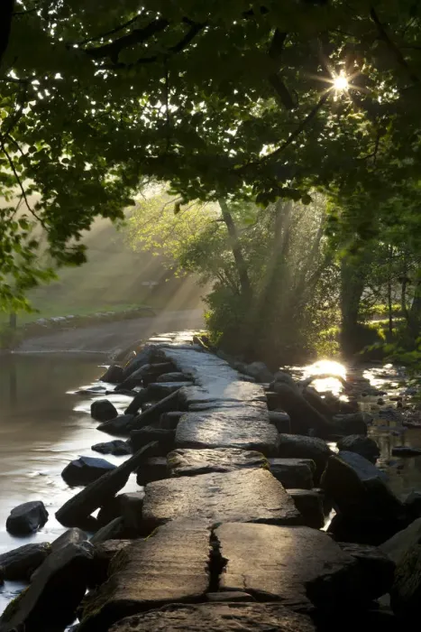 Framed Print : Early morning sunlight shining onto Tarr Steps ancient clapper bridge, Exmoor National Framed Print : Early morning sunlight shining onto Tarr Steps ancient clapper bridge, Exmoor National