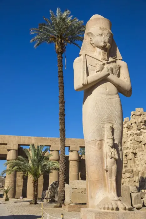 Framed Print : Egypt, Luxor, Karnak Temple, Colossal statue of King Ramesses II with his daughter