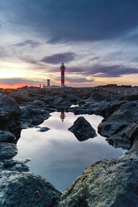 Framed Print : El Toston lighthouse reflected in the sea at sunrise, El Cotillo, Fuerteventura, Canary Islands, Spain Framed Print : El Toston lighthouse reflected in the sea at sunrise, El Cotillo, Fuerteventura, Canary Islands, Spain