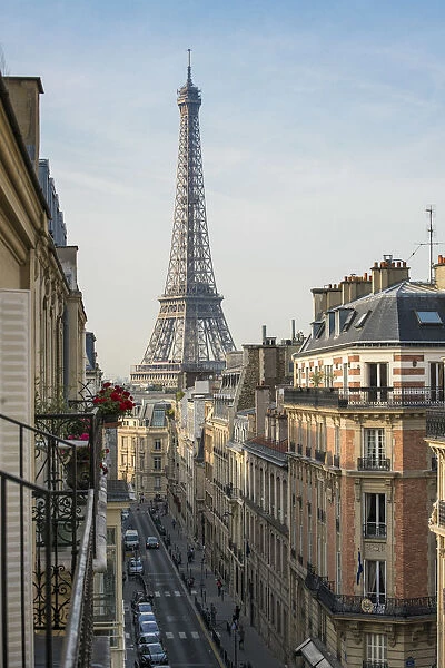 Elevated street view with Eiffel Tower in the background, Paris, France