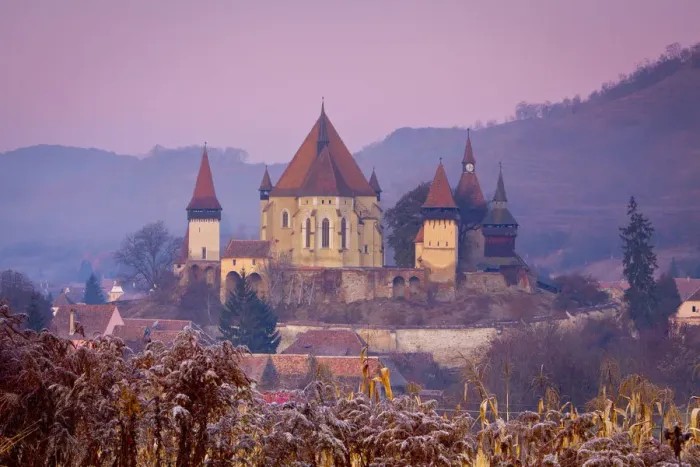 Framed Print : Elevated view towards Biertan fortified church at dusk, Biertan, nr Framed Print : Elevated view towards Biertan fortified church at dusk, Biertan, nr