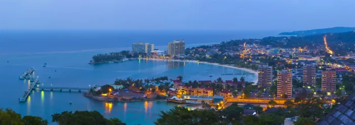 Framed Print : Elevated view over city & coastline illuminated at dusk, Ocho Rios, St. Ann Parish Framed Print : Elevated view over city & coastline illuminated at dusk, Ocho Rios, St. Ann Parish