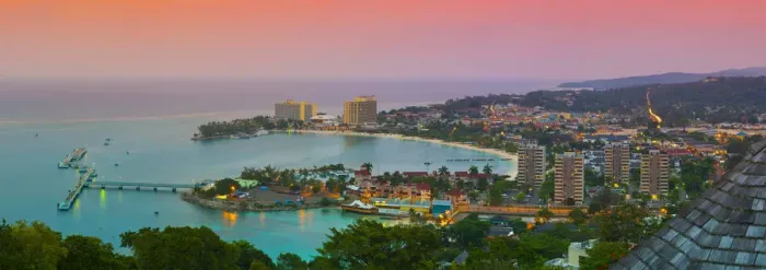 Framed Print : Elevated view over city & coastline illuminated at sunset, Ocho Rios, St. Ann Parish Framed Print : Elevated view over city & coastline illuminated at sunset, Ocho Rios, St. Ann Parish