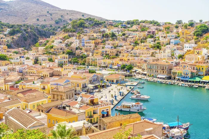 Framed Print : Elevated view over the colourful harbour in Symi, Dodecanese Islands, Greece Framed Print : Elevated view over the colourful harbour in Symi, Dodecanese Islands, Greece