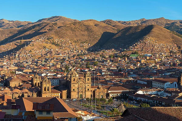 Elevated view of Cusco Cathedral, Church of the Society of Jesus and Plaza de Armas Square at sunset, UNESCO, Cusco, Cusco Province, Cusco Region, Peru