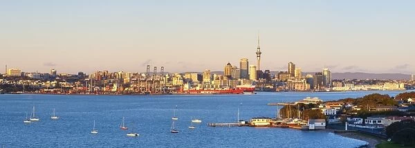 Elevated View Over Devenport towards Central Business District illuminated at sunrise, Auckland, New Zealand