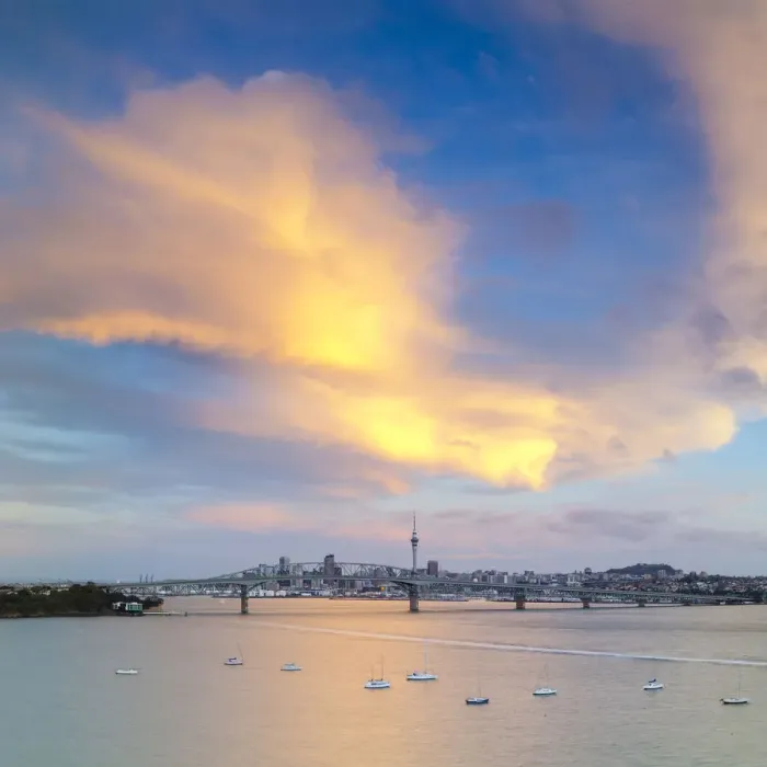 Framed Print : Elevated View Towards the Harbour Bridge and Central Business District illuminated at sunset, Auckland