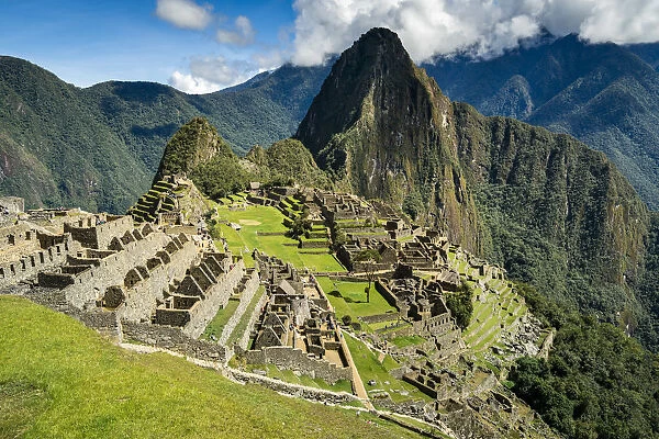 Elevated view of historic Incan Machu Picchu on mountain in Andes, Cuzco Region, Peru