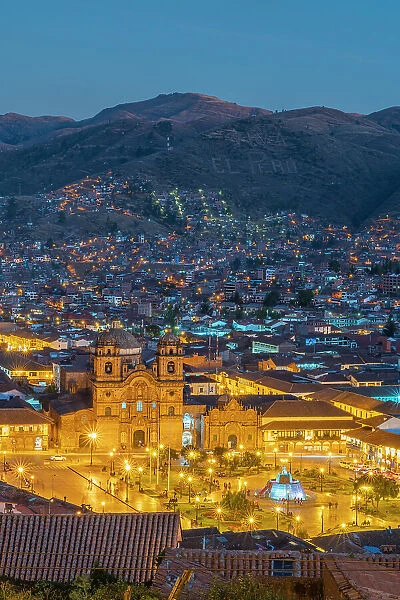 Elevated view of illuminated Church of the Society of Jesus and Plaza de Armas Square at twilight, UNESCO, Cusco, Cusco Province, Cusco Region, Peru