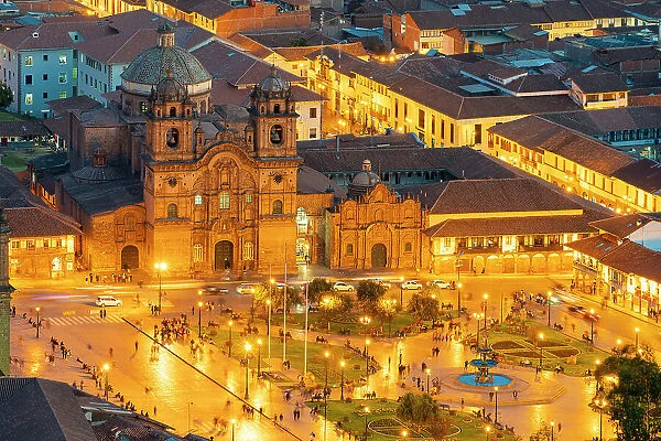 Elevated view of illuminated Church of the Society of Jesus and Plaza de Armas Square at twilight, UNESCO, Cusco, Cusco Province, Cusco Region, Peru