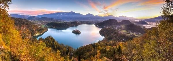 Elevated view over Lake Bled & the Julian Alps illuminated at Sunrise, Lake Bled